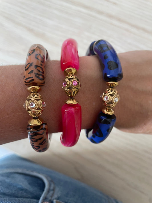 Bracelet Nomad – Perle ethnique et rondelles dorées acier